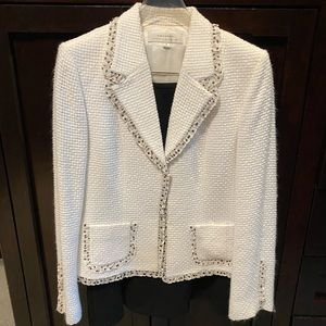 Tahari white cotton jacket and black tulip skirt.